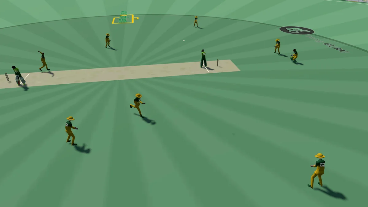 The drone camera over the pitch in the Howzat Live cricket game - the bowler running in, the batter waiting and the close fielders set